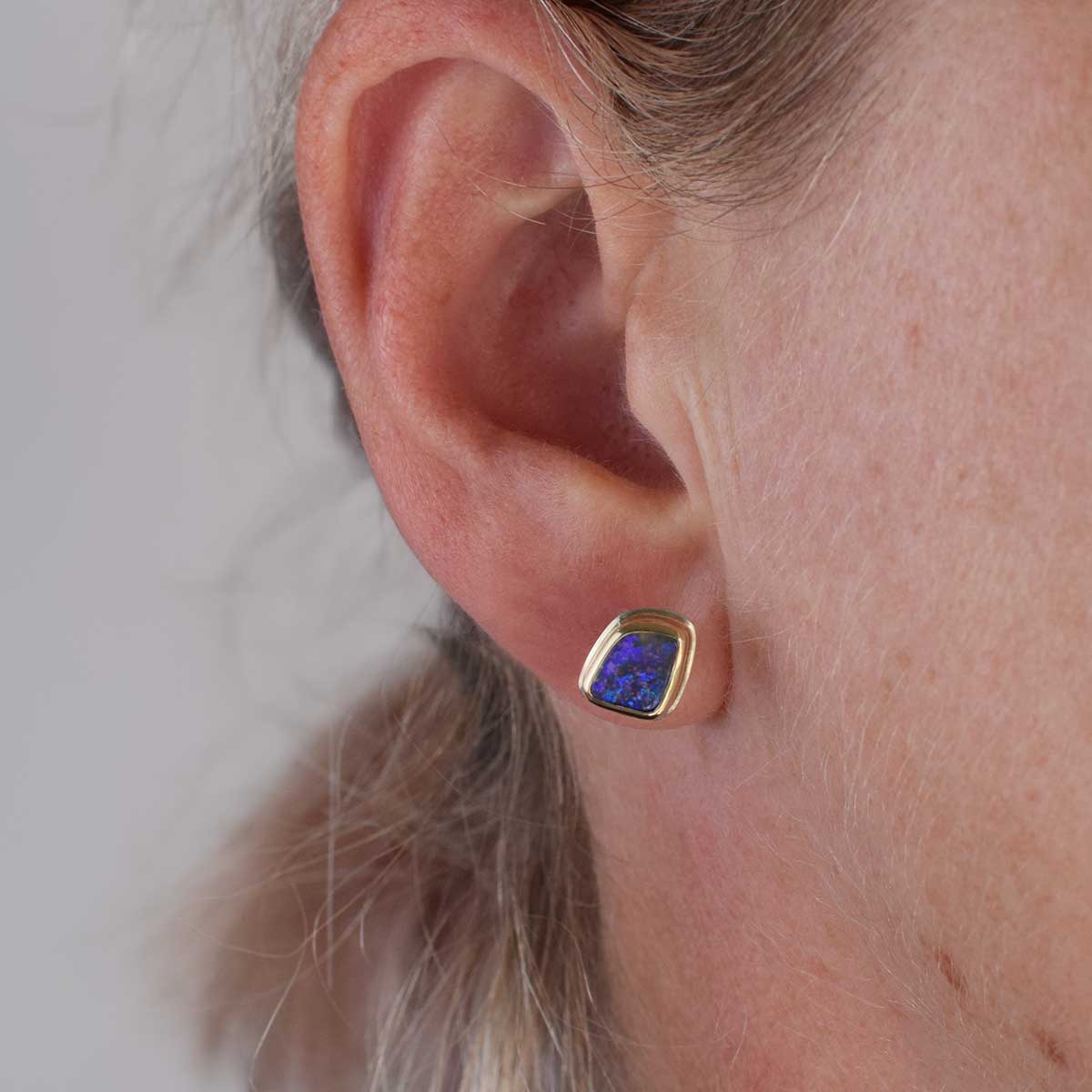 Asymmetric boulder opal studs with 9K gold bezels and sterling silver posts, handmade in Australia
