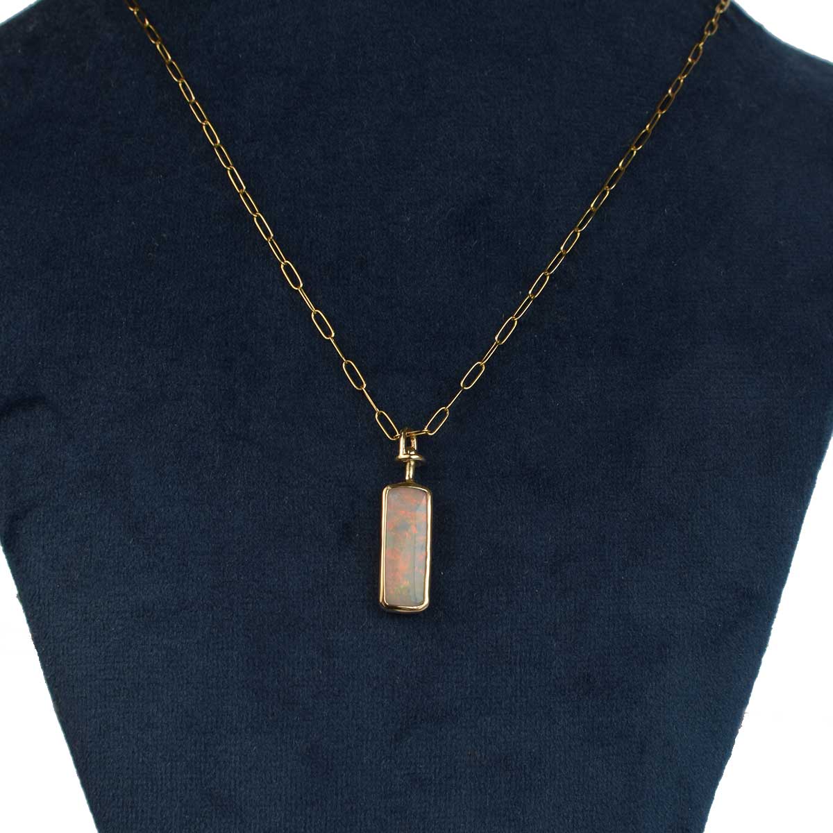 Close-up of handcrafted 14K gold swivel mechanism on Dual Horizon double-sided opal necklace (ONG002) allowing pendant to rotate and reveal both polished faces