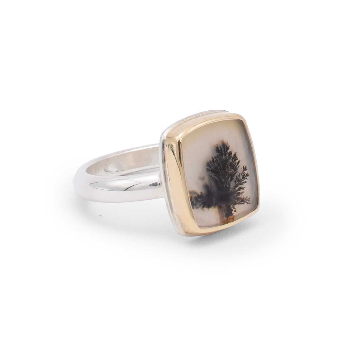 Ring with a unique stone design on a white background