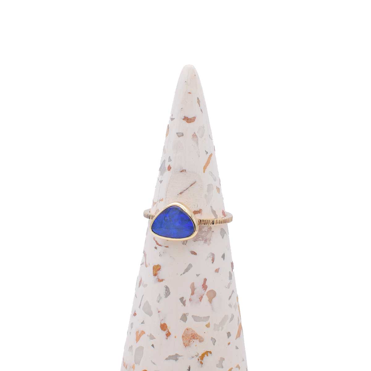 Freeform triangular semi black opal set east-west in handmade 9K gold ring